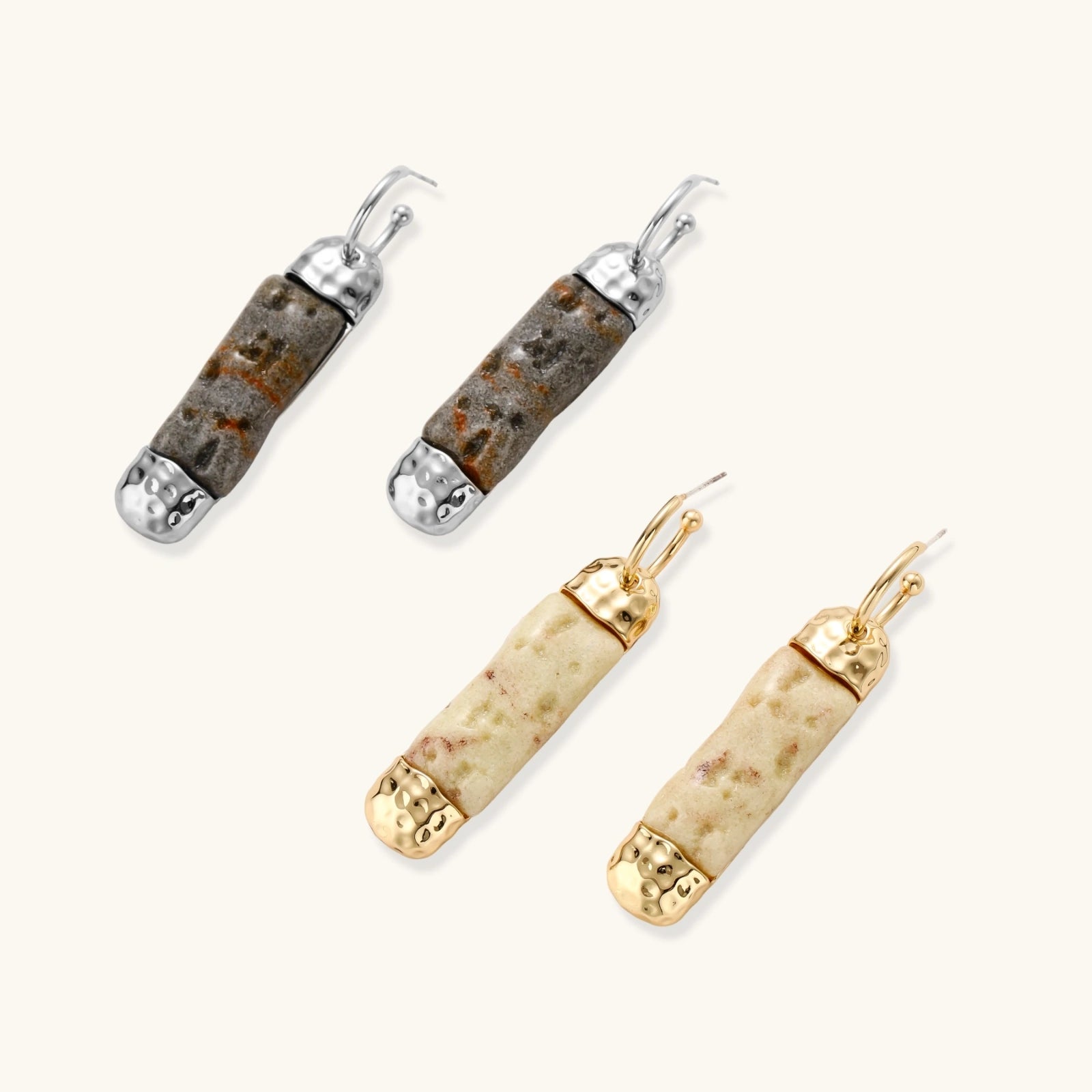 Cylindrical resin earrings with gray stone-like patterns and silver-toned metal caps, hanging against white background